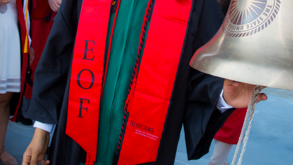 A close up of a student's regalia