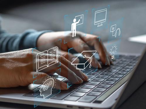 hands on a laptop keyboard