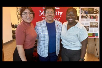 Rutgers-Newark Chancellor Tonya Smith-Jackson (center) with Earth & Environmental Science graduate students Katherine Rodriguez (left) and Suah Yekeh (right)