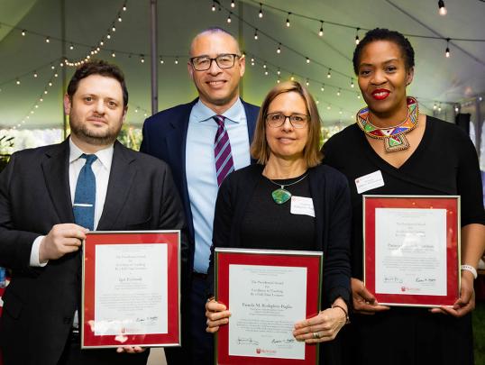 Igor Rybinnik, President Holloway, Pamela M. Rothpletz-Puglia, and Patricia O'Brian-Richardson